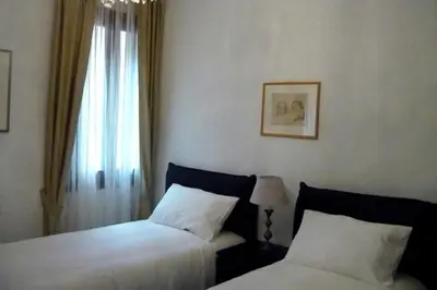 Letto o letti in una camera di Residenza Procuratie Uno