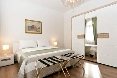 Letto o letti in una camera di Residenza Procuratie Uno