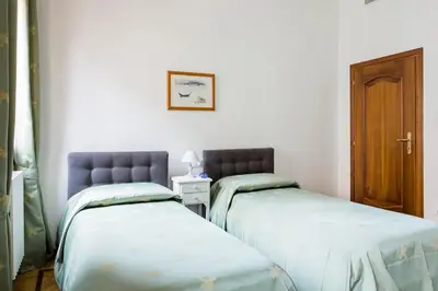 Letto o letti in una camera di Residenza Procuratie Due