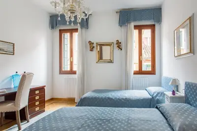 Letto o letti in una camera di Residenza Procuratie Due