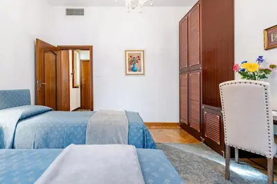 Letto o letti in una camera di Residenza Procuratie Due