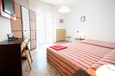 Letto o letti in una camera di Hotel Milan
