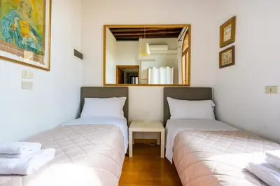Letto o letti in una camera di Ca' Romite by Sarlux