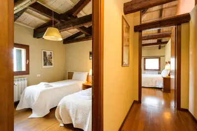 Letto o letti in una camera di Ca' Turchette by Sarlux