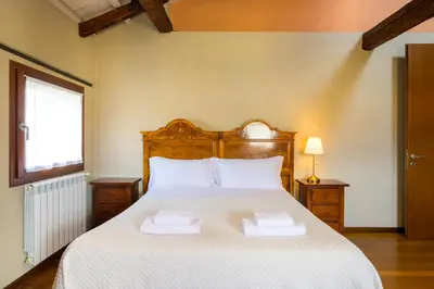 Letto o letti in una camera di Ca' Turchette by Sarlux