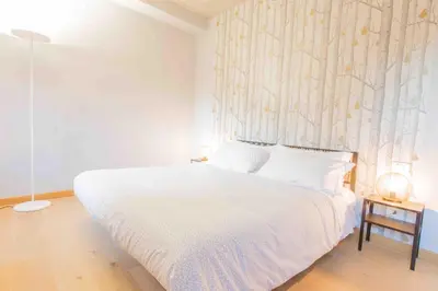 Letto o letti in una camera di CA CORTE NOVA design apartment with canal view
