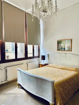 Letto o letti in una camera di B&B Ca' Dor