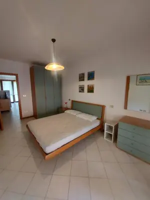 Letto o letti in una camera di Corallo Cavallino