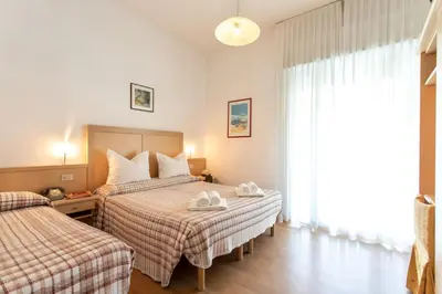 Letto o letti in una camera di Hotel Venezia e la Villetta