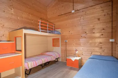 Letto o letti in una camera di Agriturismo Biologico La Buona Terra