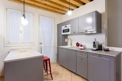 Cucina o angolo cottura di La Bella Vita - Appartamenti Mimì & Cocò