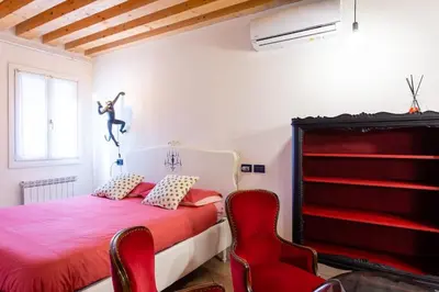 Letto o letti in una camera di La Bella Vita - Appartamenti Mimì & Cocò
