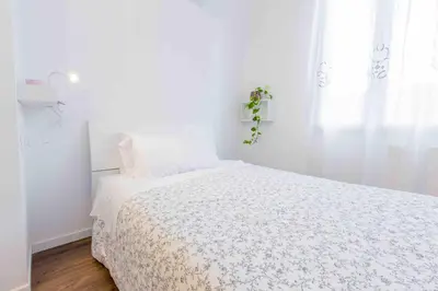 Letto o letti in una camera di CA ZULIAN amazing canal view apartment