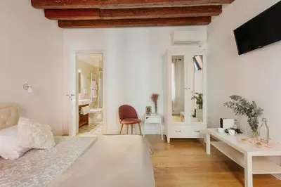 Letto o letti in una camera di Bianca Cappello House