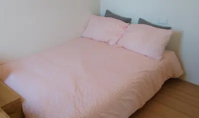 Letto o letti in una camera di Biennale House