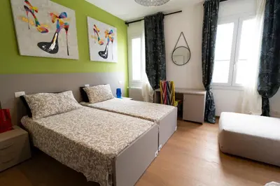 Letto o letti in una camera di LA CASA QUADRA
