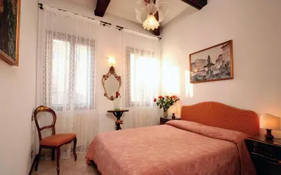 Letto o letti in una camera di Hotel At Leonard