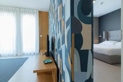 Letto o letti in una camera di Mosella Suite Hotel