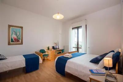 Letto o letti in una camera di Casa Al Carmine