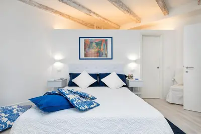Letto o letti in una camera di Biennale 1&2 , Elegant Apartments 15 min walk from St Marks Square - Venice Heaven Apartments Collection