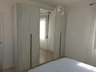 Letto o letti in una camera di Casa Roberta