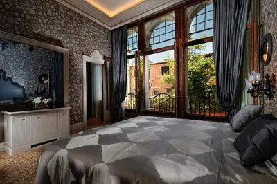 Letto o letti in una camera di Hotel Palazzetto Madonna
