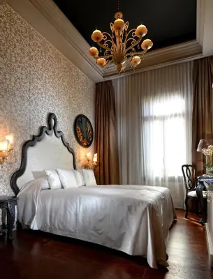 Letto o letti in una camera di Hotel Palazzetto Madonna