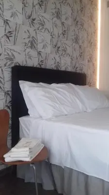 Letto o letti in una camera di Casa Lidia - ALLOGGI SMART