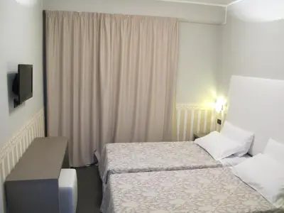 Letto o letti in una camera di Hotel Laguna Residence