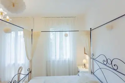 Letto o letti in una camera di VILLA MAGNOLIA