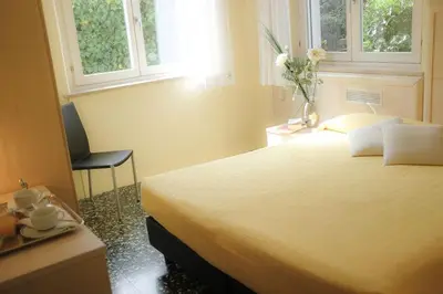 Letto o letti in una camera di Hotel Santa Lucia