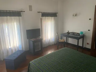 Letto o letti in una camera di Albergo La Bersagliera