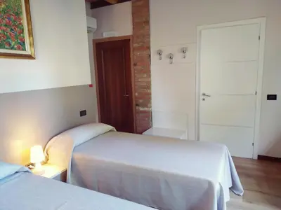 Letto o letti in una camera di Agriturismo le Colonie