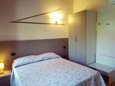 Letto o letti in una camera di Agriturismo le Colonie
