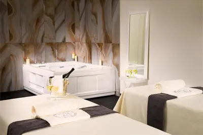 Letto o letti in una camera di Hotel Due Torri