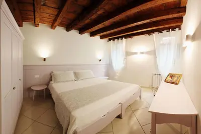 Letto o letti in una camera di Ca' de l'Anzolo