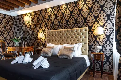 Letto o letti in una camera di Domus Superior