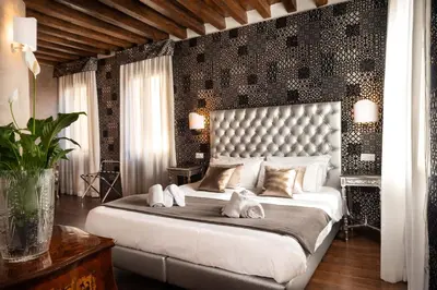Letto o letti in una camera di Domus Superior