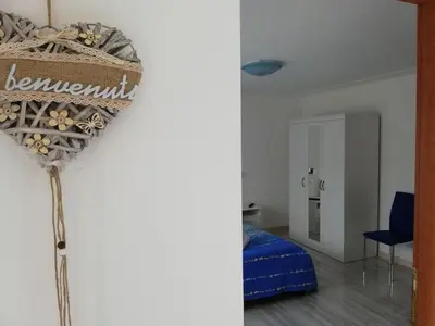 Letto o letti in una camera di Appartamento Le Magnolie 2
