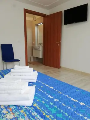 TV o dispositivi per l'intrattenimento presso Appartamento Le Magnolie 2