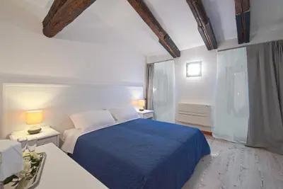 Letto o letti in una camera di Palazzetto Canossa