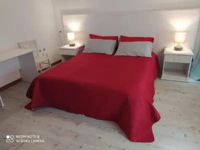 Letto o letti in una camera di Palazzetto Canossa