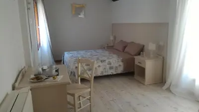 Letto o letti in una camera di Palazzetto Canossa