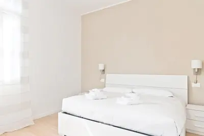 Letto o letti in una camera di GuestHost - Prato della Valle Roomy Flat
