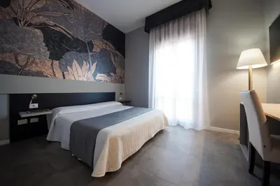 Letto o letti in una camera di Hotel Master