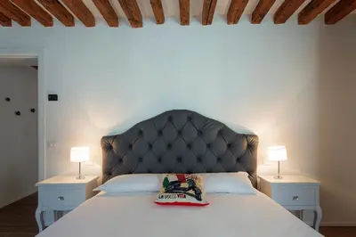 Letto o letti in una camera di Hostmate - Venezia - Salizada