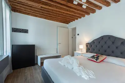 Letto o letti in una camera di Hostmate - Venezia - Salizada