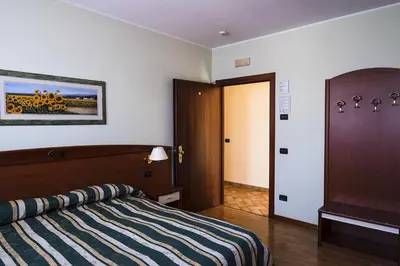 Letto o letti in una camera di Agriturismo il Cascinale