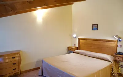 Letto o letti in una camera di Hotel Casanova