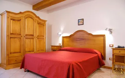 Letto o letti in una camera di Hotel Casanova